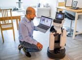 Dr Mauro Dragone with Toyota’s Human Support Robot.