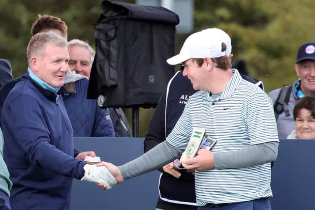 Dougie and Bob MacIntyre shake hands before heading out in the first round of the Alfred Dunhill Links Championship. Picture: Kevin McGlynn