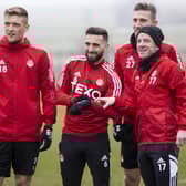 Graeme Shinnie is enjoying playing under former team-mate Barry Robson. (Photo by Alan Harvey / SNS Group)