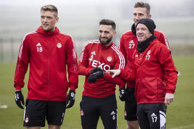 Graeme Shinnie is enjoying playing under former team-mate Barry Robson. (Photo by Alan Harvey / SNS Group)