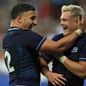 Scotland's wing Darcy Graham celebrates with Scotland's inside centre Sione Tuipulotu after beating Tonga.