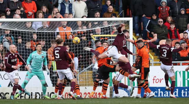 Hearts' Craig Halkett scores to make it 2-2 at Tannadice. (Photo by Alan Harvey / SNS Group)
