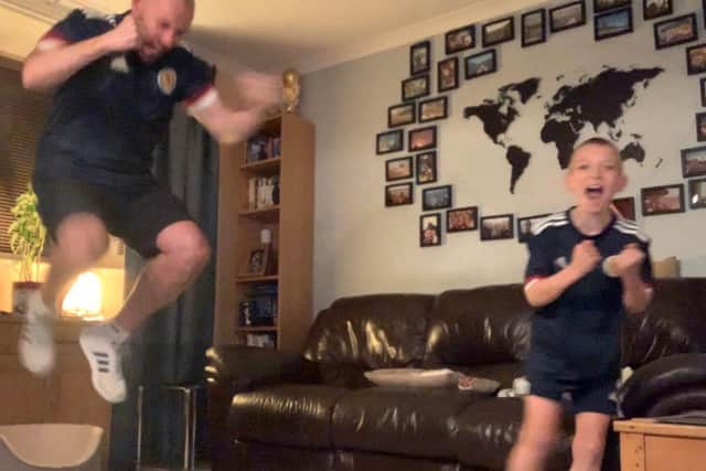 Iain Meiklejohn and his son Aleks celebate Scotland winning on penalties