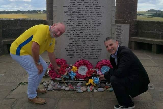 Consul-General Jack Hillmyer and Phil Mills-Bishop lay a wreath.