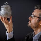 Dr Adrian Maldonado, Galloway Hoard Researcher at National Museum of Scotland, with 3D reconstruction of Silver vessel from the Hoard ,which is now on display at Kirkcudbright Galleries. PIC: Neil Hanna.