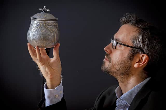 Dr Adrian Maldonado, Galloway Hoard Researcher at National Museum of Scotland, with 3D reconstruction of Silver vessel from the Hoard ,which is now on display at Kirkcudbright Galleries. PIC: Neil Hanna.