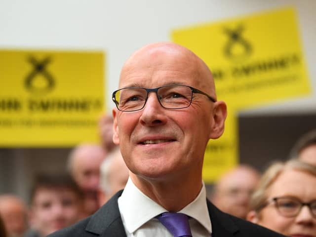 John Swinney reacts after delivering a speech to announce his intentions of running for the SNP leadership as well as his candidacy for the Scotland's First Minister position. Picture: Andy Buchanan/AFP via Getty Images