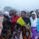 Mourners arrive for a mass funeral procession for mudslide victims at Chilobwe townships Naotcha Primary school camp in Blantyre, Malawi earlier this week.