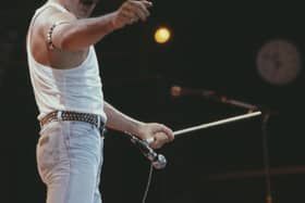Freddie Mercury, of the pop band Queen, performing on stage during the Live Aid concert. Picture: PA Wire