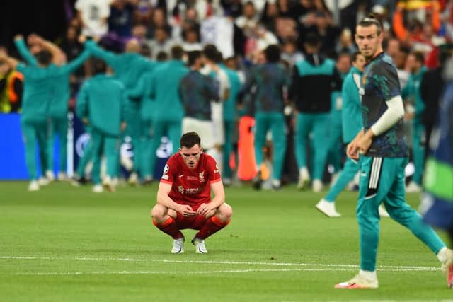 Andy Robertson of Liverpool is dejected after defeat to Real Madrid in the Champions League final at Stade de France, Paris. (Photo by Andrew Powell/Liverpool FC via Getty Images)