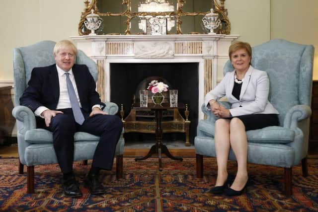 Boris Johnson and Nicola Sturgeon need to remember that 'Middle Scotland', not their most ardent supporters, will decide the independence question (Picture: Duncan McGlynn/pool/AFP via Getty Images)