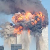 Explosions in the two towers of the World Trade Center in New York city after they were hit by planes on September 11, 2001 (Picture: Spencer Platt/Getty Images)