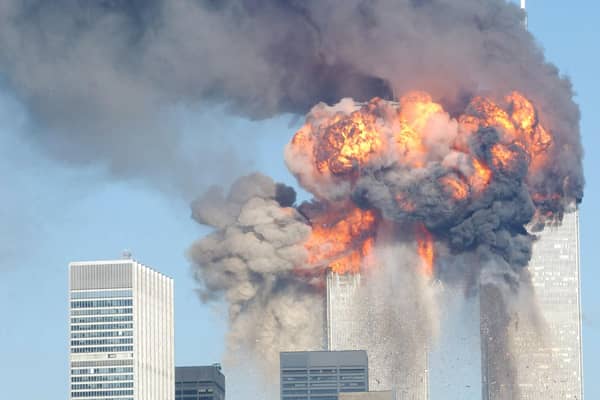 Explosions in the two towers of the World Trade Center in New York city after they were hit by planes on September 11, 2001 (Picture: Spencer Platt/Getty Images)