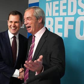 Former Conservative MP Robert Jenrick is welcomed by Reform UK Leader Nigel Farage at a press conference to announce the former's defection on 15 January (Picture: Carl Court/Getty Images)