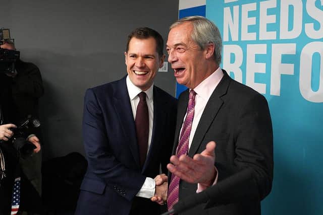 Former Conservative MP Robert Jenrick is welcomed by Reform UK Leader Nigel Farage at a press conference to announce the former's defection on 15 January (Picture: Carl Court/Getty Images)