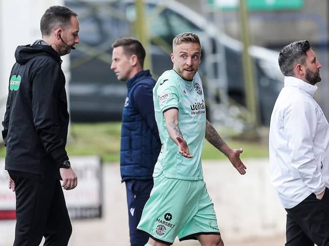 Hibs midfielder James Jeggo walks off the pitch after being shown a red card in the 1-1 draw at St Johnstone. (Photo by Ewan Bootman / SNS Group)