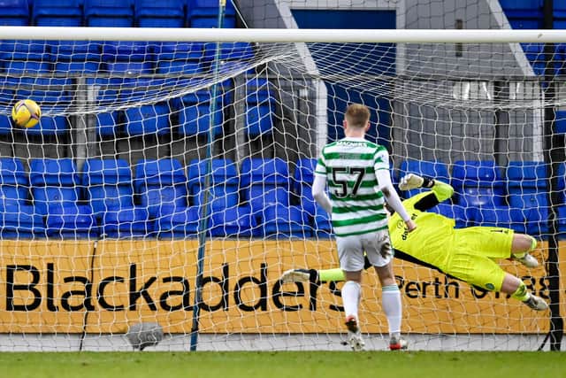 St Johnstone's Chris Kane (not pictured) makes it 2-1, beating Celtic goalkeeper Vasilis Barkas.