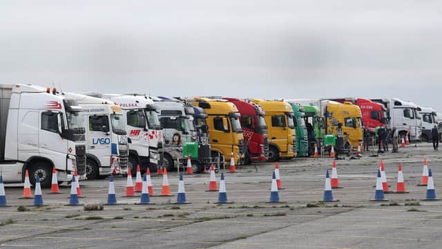 Freight lorries lined up at the front of the queue on the runway at Manston Airport, Kent.