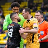 Dundee United's Aziz Behich was sent off during the 2-1 defeat by Livingston.