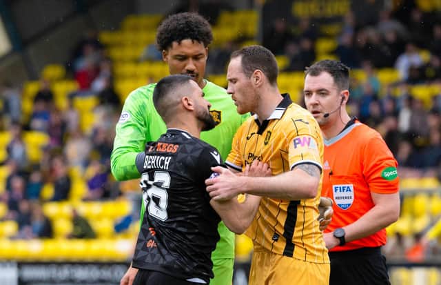 Dundee United's Aziz Behich was sent off during the 2-1 defeat by Livingston.