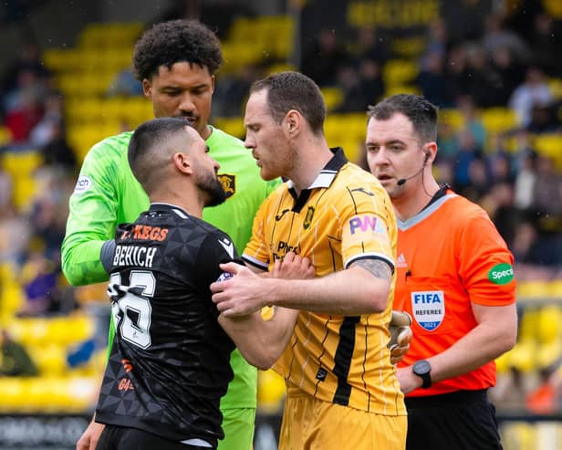 Dundee United's Aziz Behich was sent off during the 2-1 defeat by Livingston.