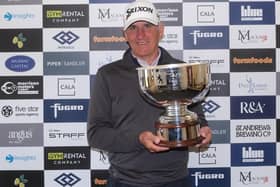 Euan McIntosh shows off the Montrose Links Masters after his win in an event presented by Gym Rental Co. in Angus. Picture: Tartan Pro Tour