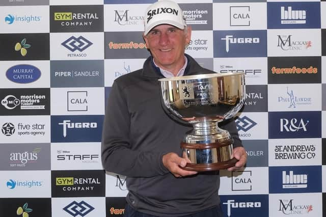 Euan McIntosh shows off the Montrose Links Masters after his win in an event presented by Gym Rental Co. in Angus. Picture: Tartan Pro Tour