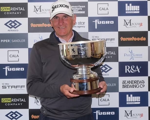Euan McIntosh shows off the Montrose Links Masters after his win in an event presented by Gym Rental Co. in Angus. Picture: Tartan Pro Tour