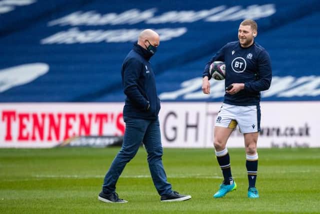 Scotland head coach Gregor Townsend (left) with Finn Russell.  (Photo by Ross Parker / SNS Group)
