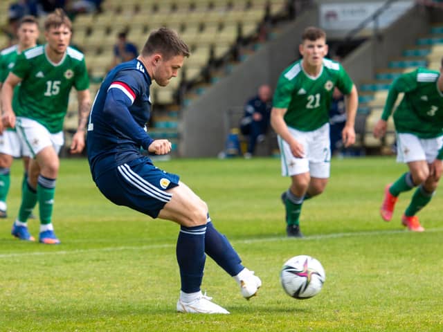 Glenn Middleton scores to make it 3-2 during a friendly match between Scotland and Northern Ireland Under-21s in Dumbarton.