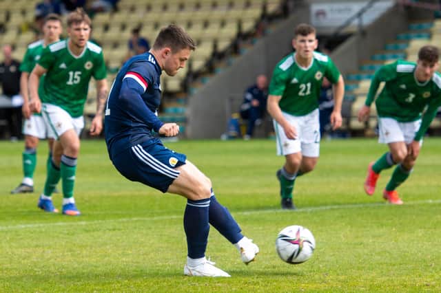 Glenn Middleton scores to make it 3-2 during a friendly match between Scotland and Northern Ireland Under-21s in Dumbarton.