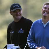 Payul Lawrie and Colin Montgomerie share a joke during a practice round for the 2004 Masters at Augusta National Golf Club. Picture: Andrew Redington/Getty Images.