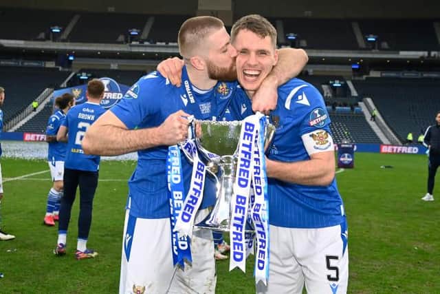 St Johnstone's Shaun Rooney and Jason Kerr (l-R) with the Betfred Cup trophy (Photo by Rob Casey / SNS Group)