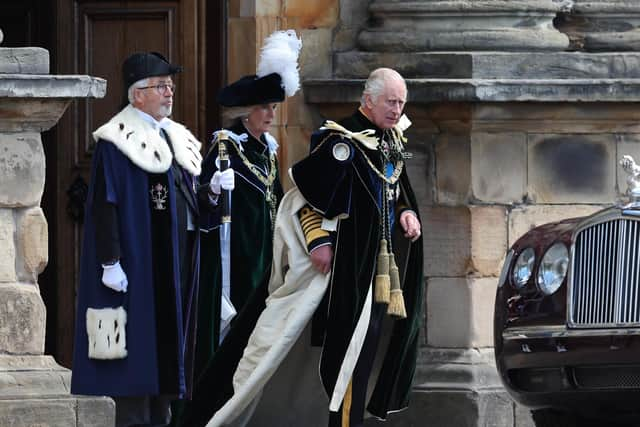 King Charles III and Queen Camilla leaving the Palace of Holyroodhouse, Edinburgh, for the National Service of Thanksgiving and Dedication