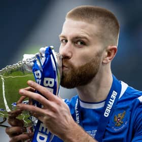 St Johnstone’s Shaun Rooney lifts with the Betfred Cup trophy after the 1-0 win over Livingston at Hampden (Photo by Craig Williamson / SNS Group)