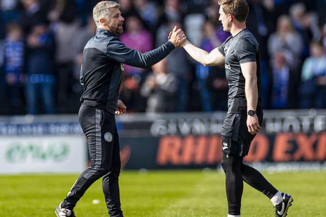 Stephen Robinson guided St Mirren into the top six despite losing 2-0 to Kilmarnock.