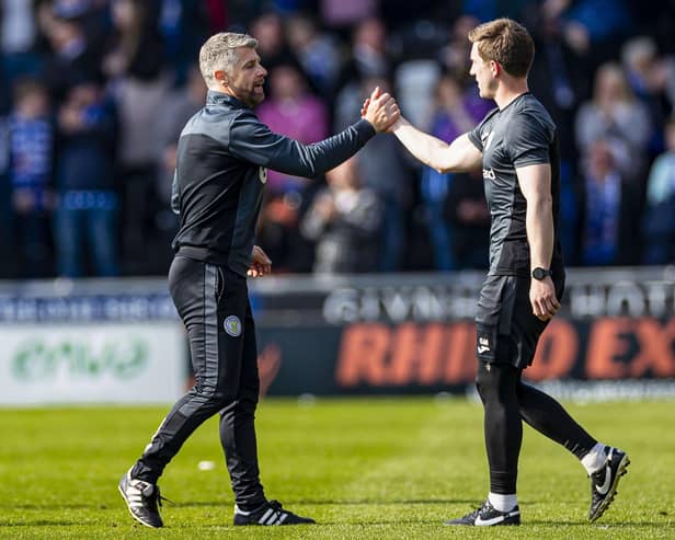 Stephen Robinson guided St Mirren into the top six despite losing 2-0 to Kilmarnock.