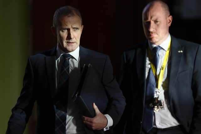 Michael Matheson leaves the chamber following First Minister's Questions, alongside his successor as health secretary, Neil Gray. Picture: Getty Images