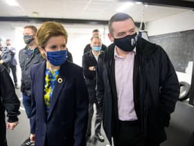 Nicola Sturgeon and Scottish Conservative leader Douglas Ross visit the Bluevale Community Club in Haghill, Glasgow, together (Picture: Wattie Cheung/pool/Getty Images)