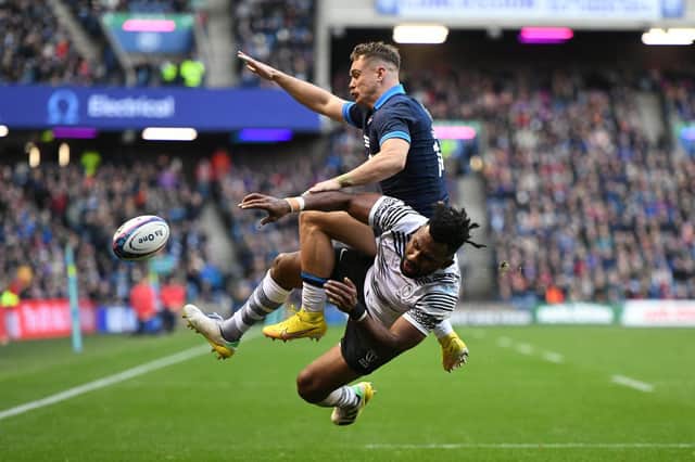 Scotland's Darcy Graham is denied in the corner against Fiji at BT Murrayfield. (Photo by Ross MacDonald / SNS Group)