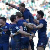 Scotland players celebrate after their victory over England in the final of the World Rugby Sevens Series tournament at Twickenham in  2017.   (Photo: OLLY GREENWOOD/AFP via Getty Images)