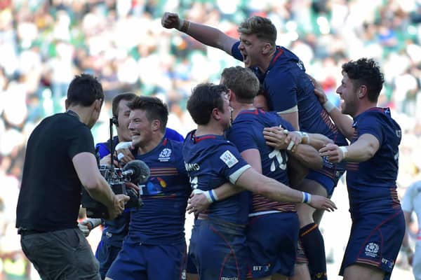 Scotland players celebrate after their victory over England in the final of the World Rugby Sevens Series tournament at Twickenham in  2017.   (Photo: OLLY GREENWOOD/AFP via Getty Images)