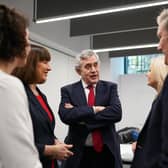 Former Labour Prime Minister Gordon Brown speaks with current party leader Keir Starmer and other party members after a press conference about The Commission on the UK’s Future report (Picture: Ian Forsyth/Getty Images)