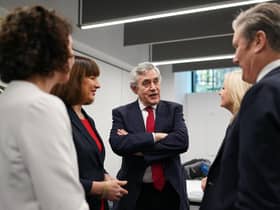 Former Labour Prime Minister Gordon Brown speaks with current party leader Keir Starmer and other party members after a press conference about The Commission on the UK’s Future report (Picture: Ian Forsyth/Getty Images)