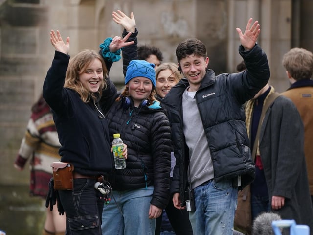 Cast and crew members on set as they film scenes for the next season of The Crown in St Andrews