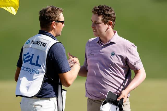 Bob MacIntyre celebrates with caddie Mike Thomson after winning his group in the World Golf Championships-Dell Technologies Match Play at Austin Country Club in Texas. Picture: Picture: Michael Reaves/Getty Images.