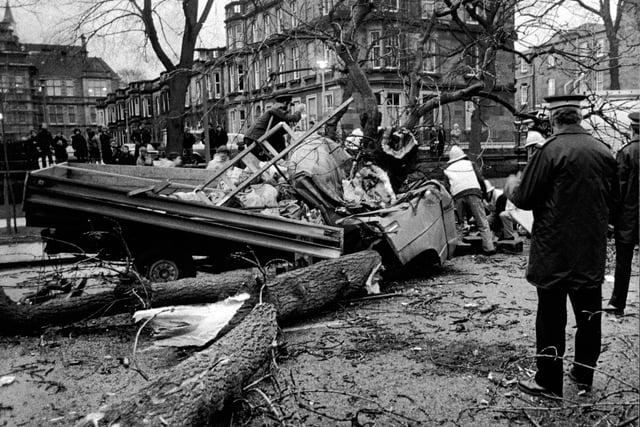 Firemen in the Meadows in December 1982 when a 50-foot tree was blown down and fell on a truck, killing the driver Stanislaw Jakubanes and injuring passenger Danuta Maj.