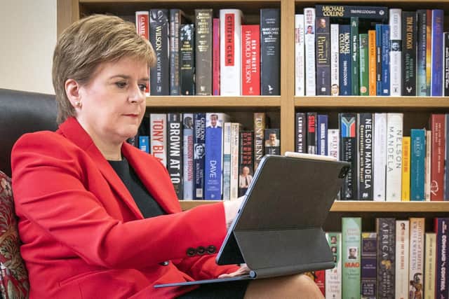 First Minister Nicola Sturgeon at her home in Glasgow preparing her speech she will give to the SNP National Conference virtually on Monday