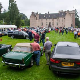 The Annual Gathering and Car Show showcases iconic Jaguars and Daimlers.