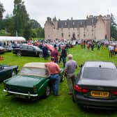The Annual Gathering and Car Show showcases iconic Jaguars and Daimlers.